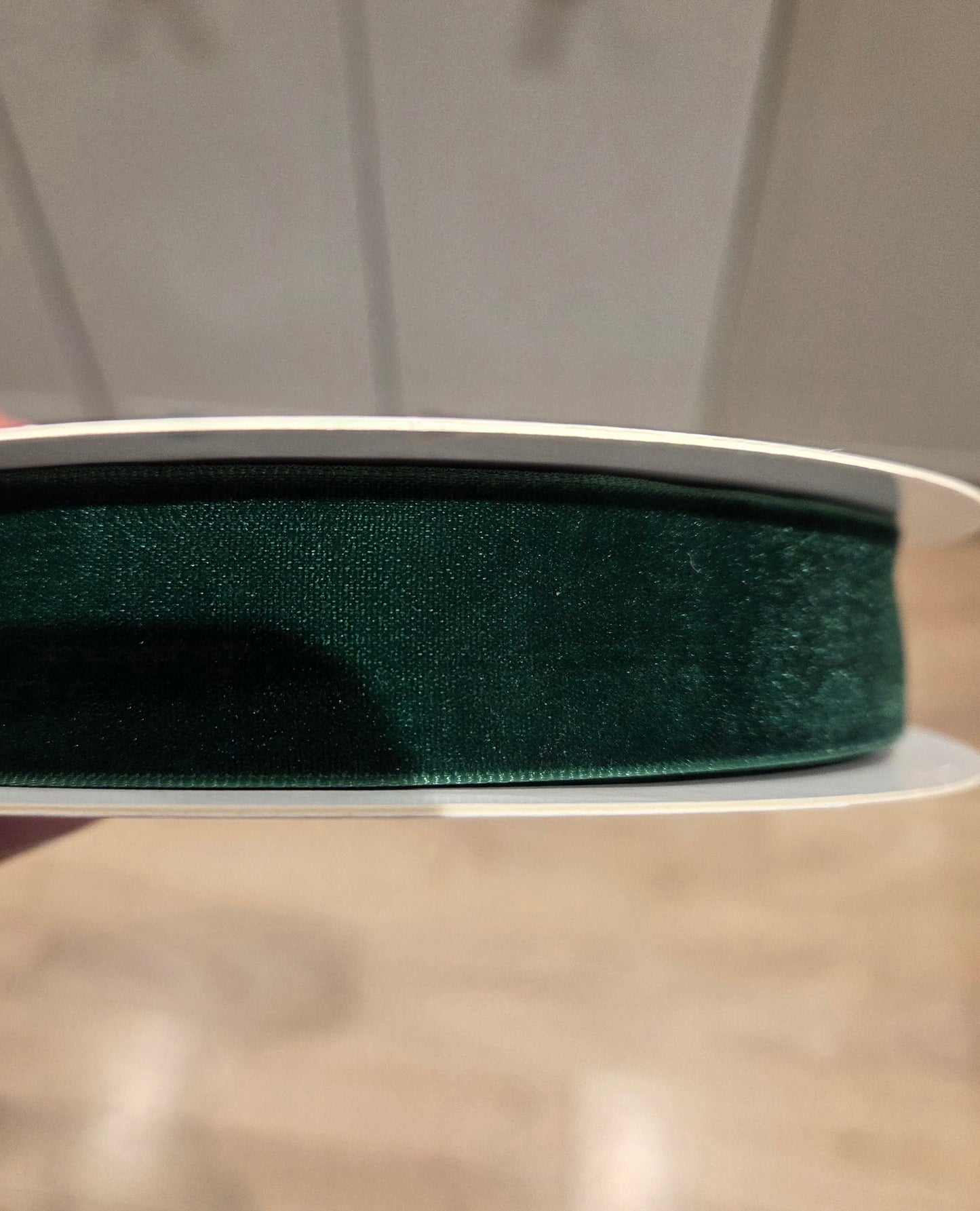 Velvet ribbon (non wired) in traditional Christmas colours (available in red, deep burgundy and deep green). 25mm wide. Sold by the meter