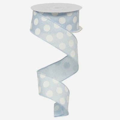 USA imported wired ribbon.  1.5" with medium size white dots on a light blue background. Sold by the meter.