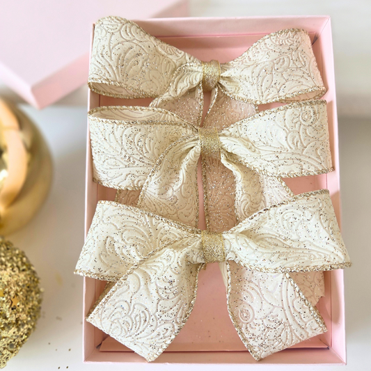 3 x Handmade bows with tails, in champagne and gold.  Approx size 13 x 11cm per bow.