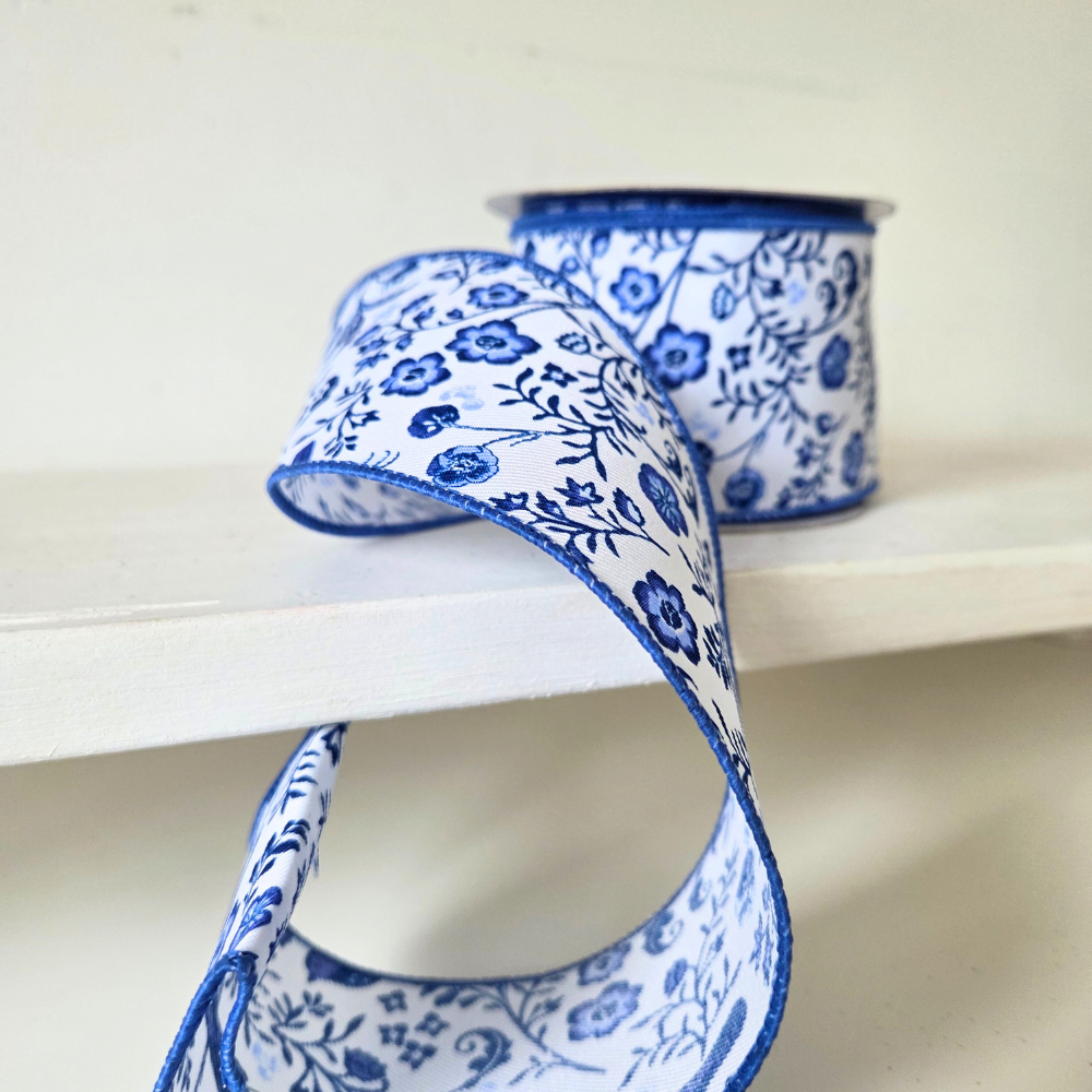 2.5" Wired Ribbon with White & Blue Chinoiserie design.  Sold by the meter