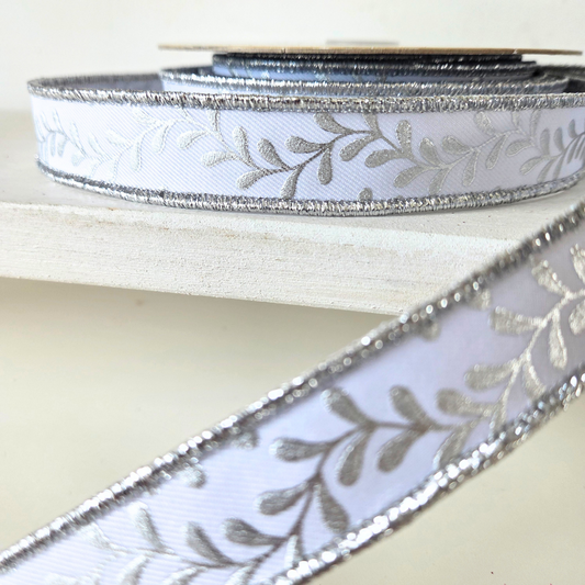 Premium USA imported wired ribbon.  7/8" Foil Leaf Garland in fused White/Silver.