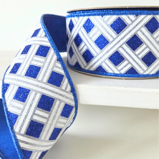 Deluxe 2.5" wide fused ribbon, with woven stripes in Silver, Royal Bllue &; White, with a royal blue fused backing.  Sold by the meter
