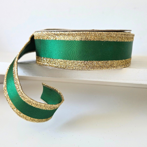 Premium USA imported wired ribbon. Deluxe 1.5" wide ribbon, Christmas green with gold glitter edges.  Sold by the meter.