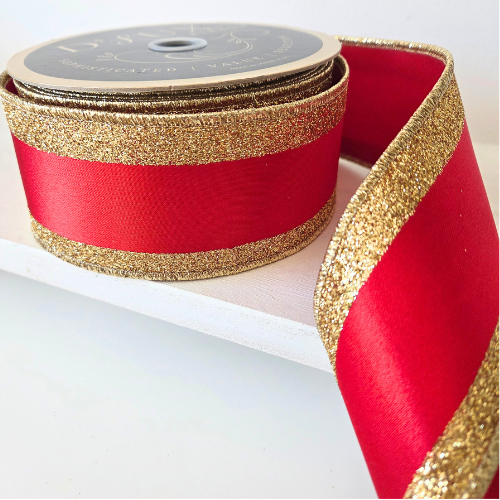 Premium USA imported wired ribbon. Deluxe 2.5" wide ribbon, Postbox red with gold glitter edges.  Sold by the meter.