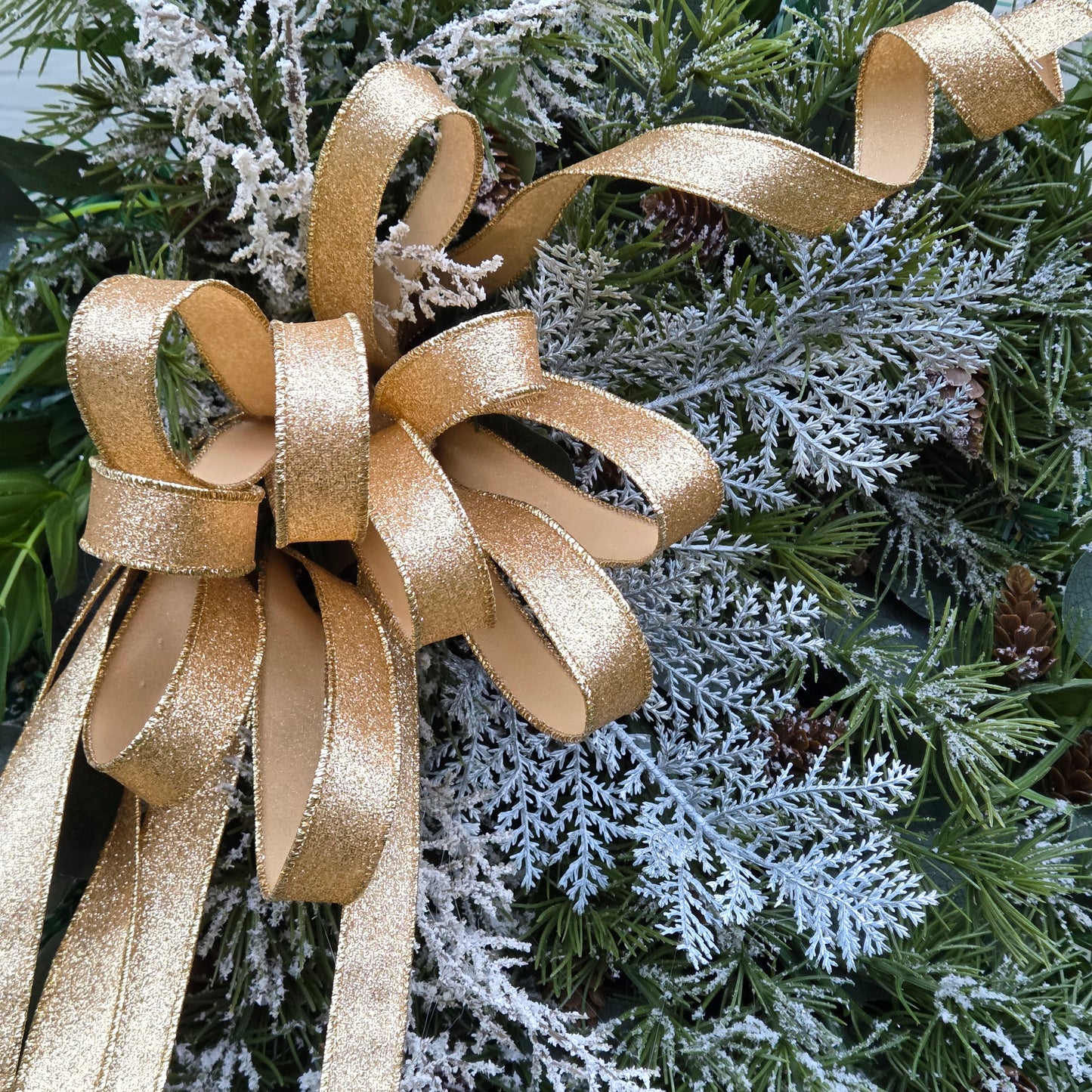 Deluxe Large Natural Swag, with luxury gold bow.  Luxury Christmas decor